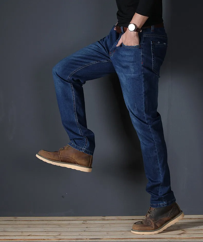 JS589J-2020 summer jeans men's straight fit large mid waist men's jeans elastic simple business pants