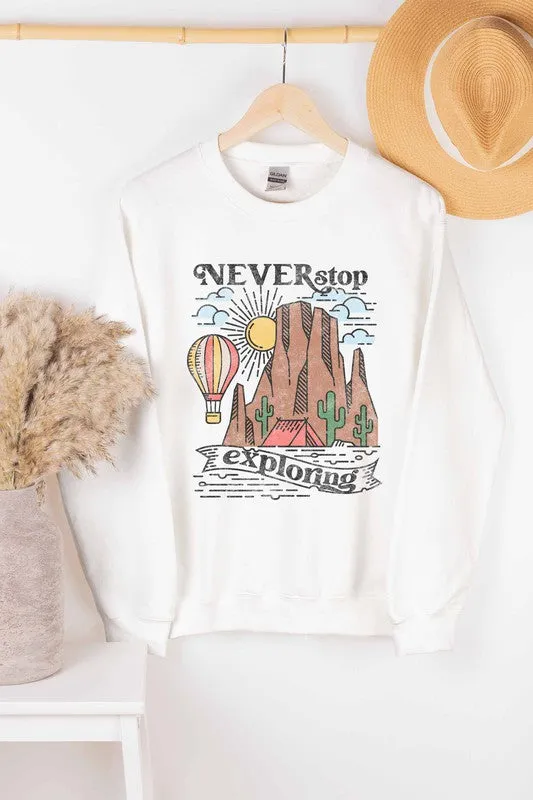 NEVER STOP EXPLORING GRAPHIC SWEATSHIRT