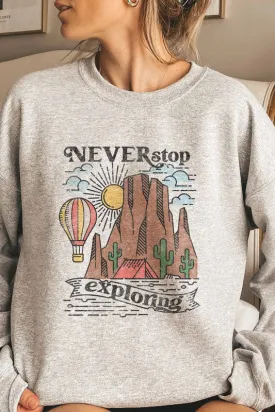 NEVER STOP EXPLORING GRAPHIC SWEATSHIRT