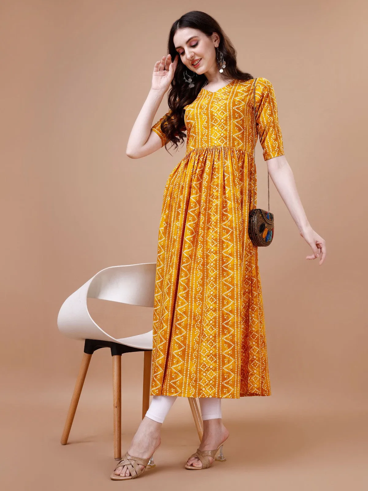 Stylish Bandhani Naira Cut Kurta with Latkan in Yellow Colour